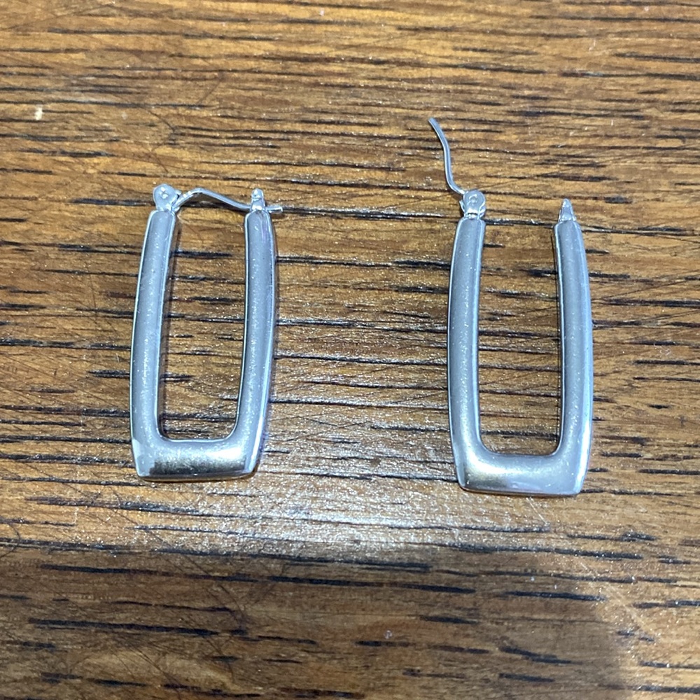 Silver 1.5 in rectangle pierced earrings. Very secure and light. They are pretty - Picture 6 of 12